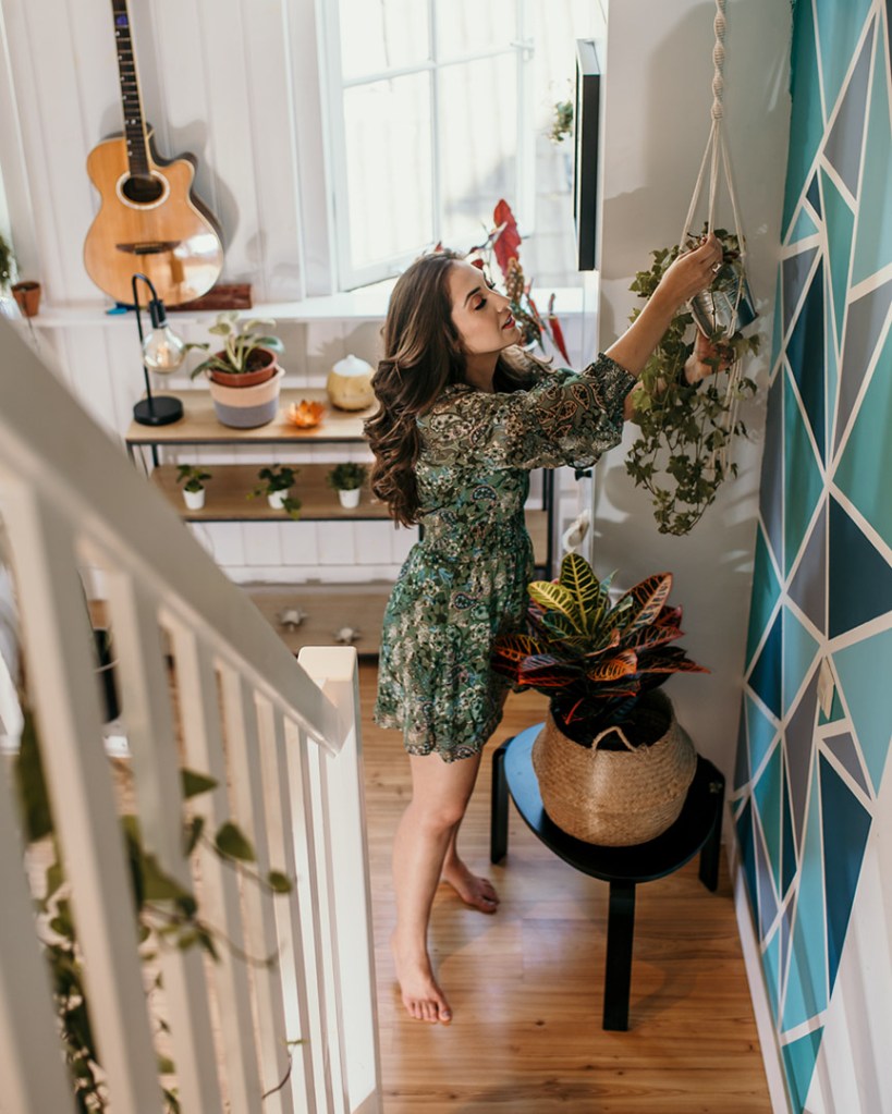 Love for plants and woman at her house