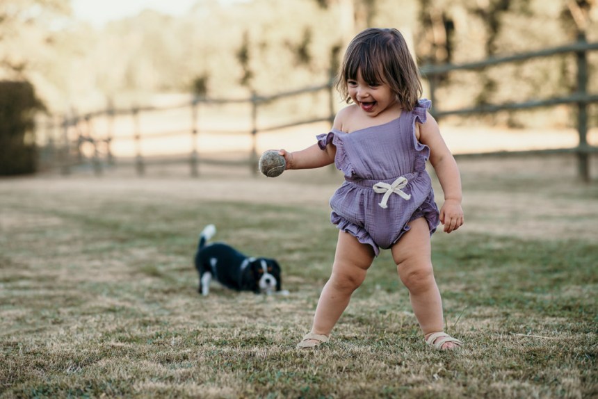 Small girl and puppy