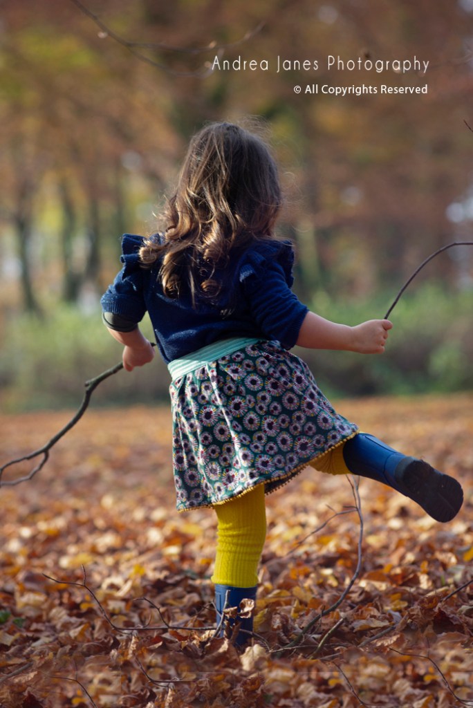 Little girl fall leaves Photos